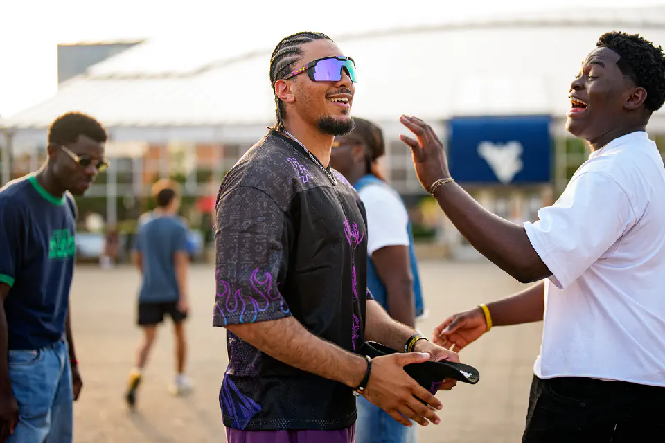 Students laughing outside of the Mountainlair