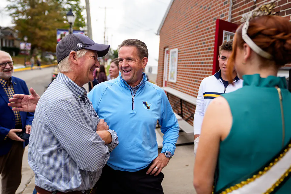 President Michael T. Benson visiting with people at the Buckwheat Festival