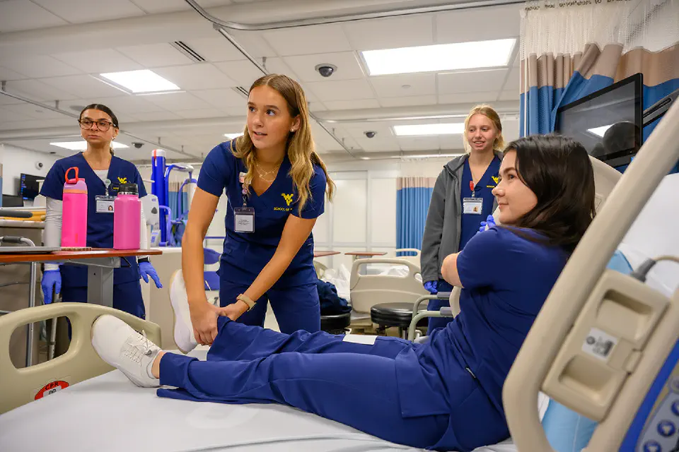 Nursing students practice skills
