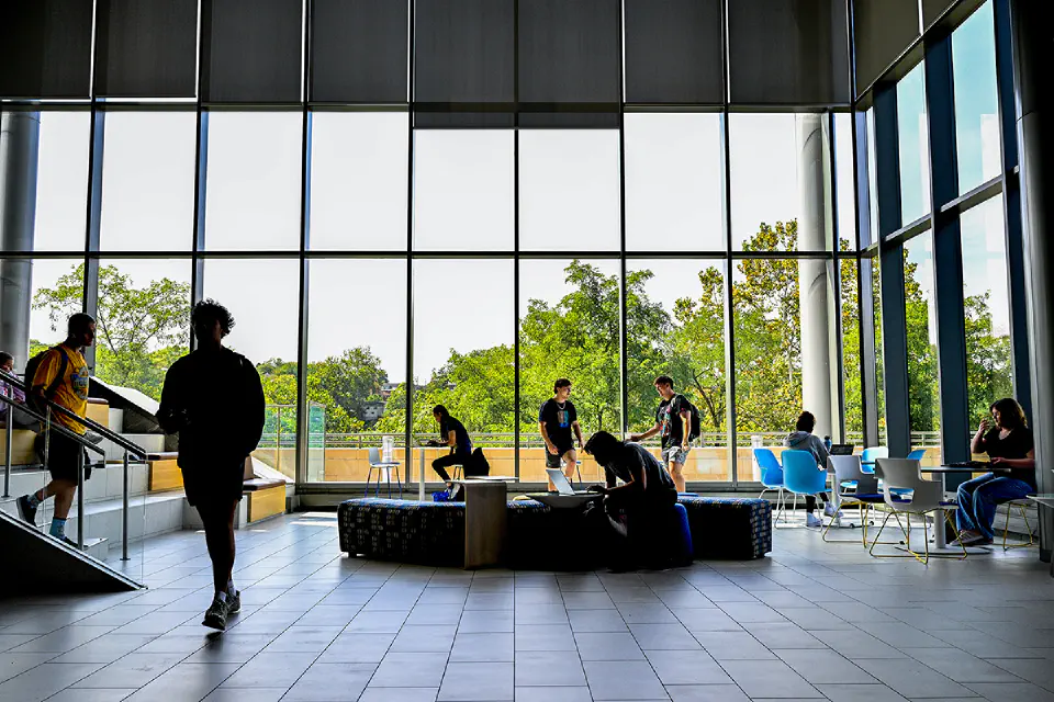 Reynolds Hall lobby bustling with students between classes.