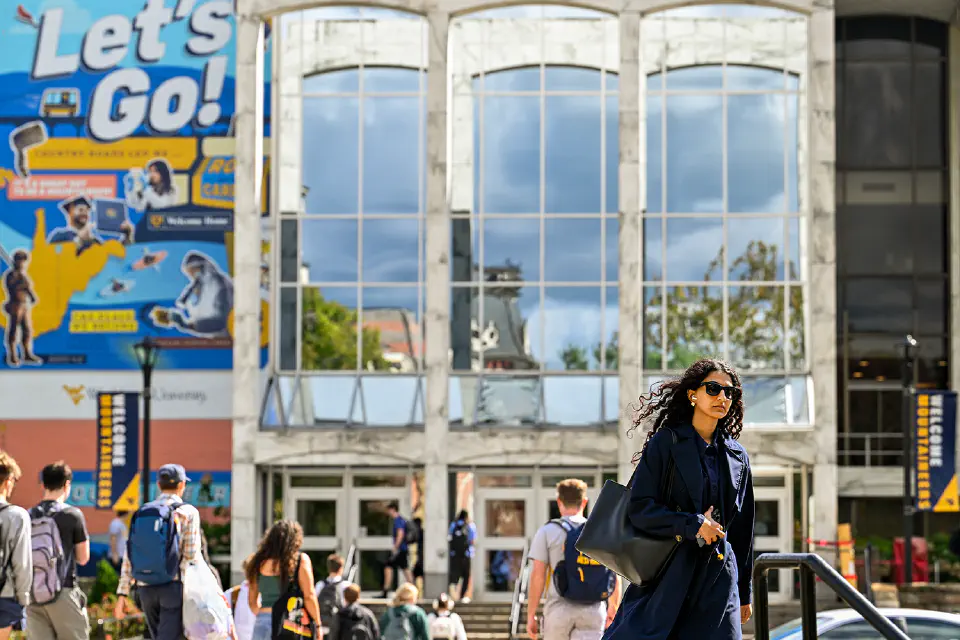 Students walking to class in front of the Mountainlair