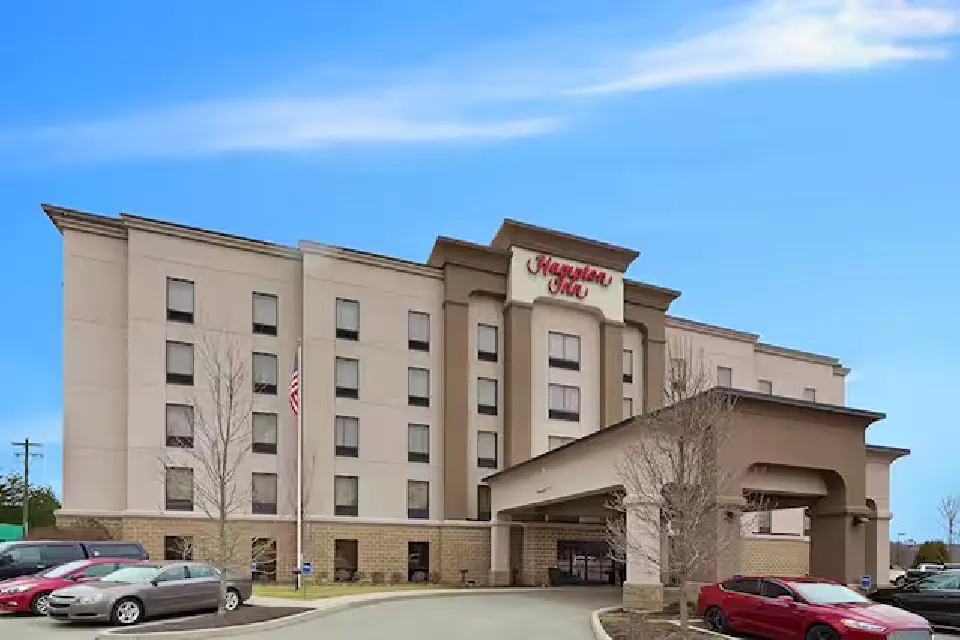 Entrance of modern 5-story hotel with on-site parking