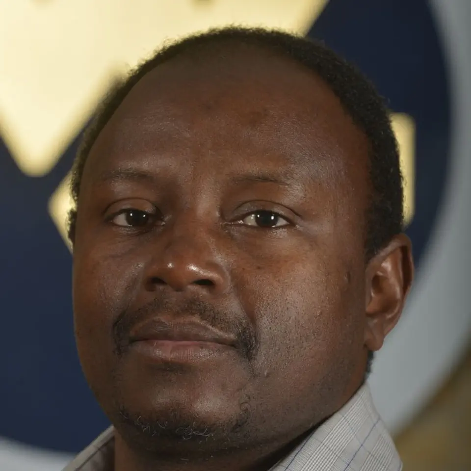 Portrait of George Mamboleo