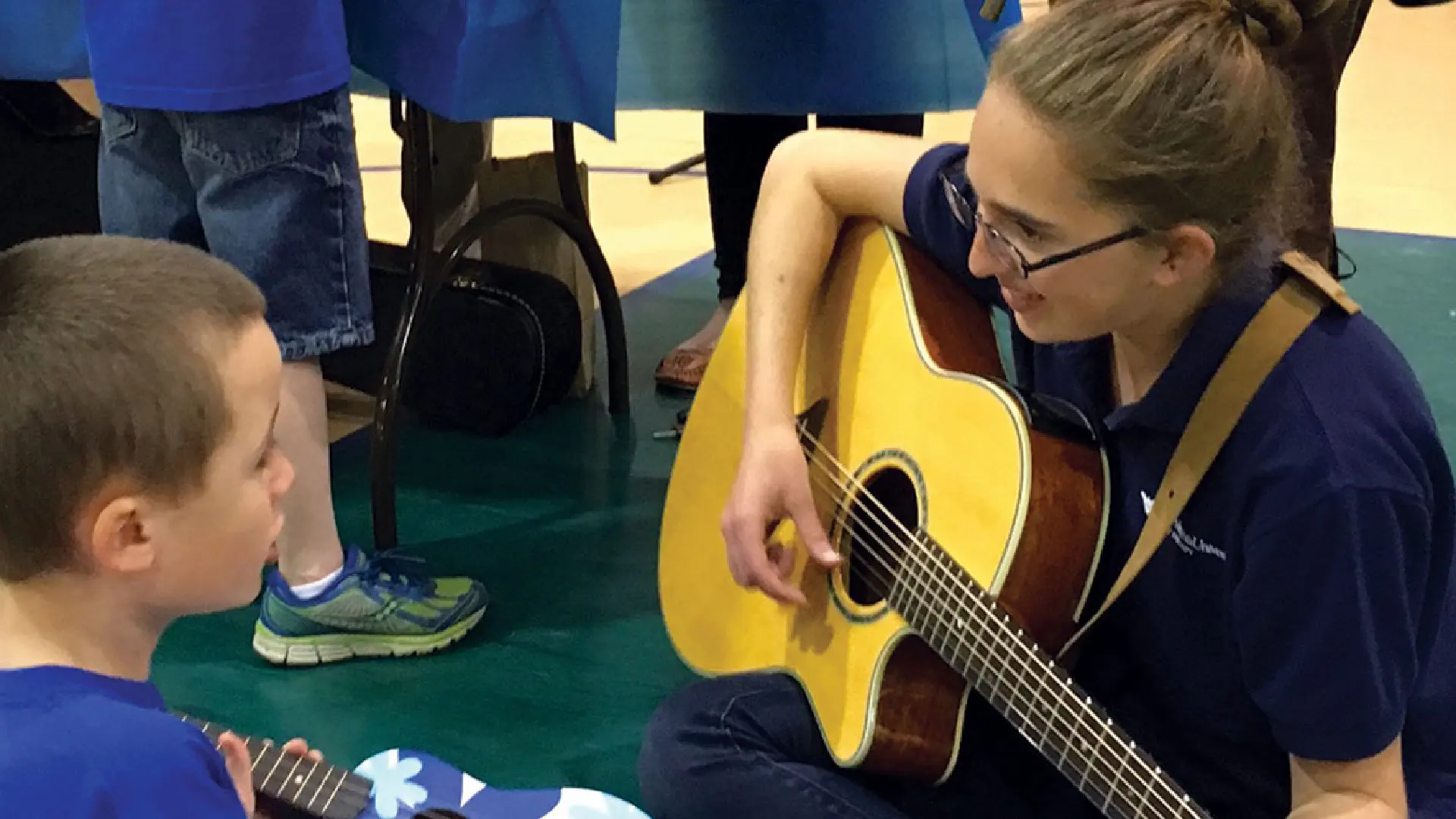 Person playing guitar