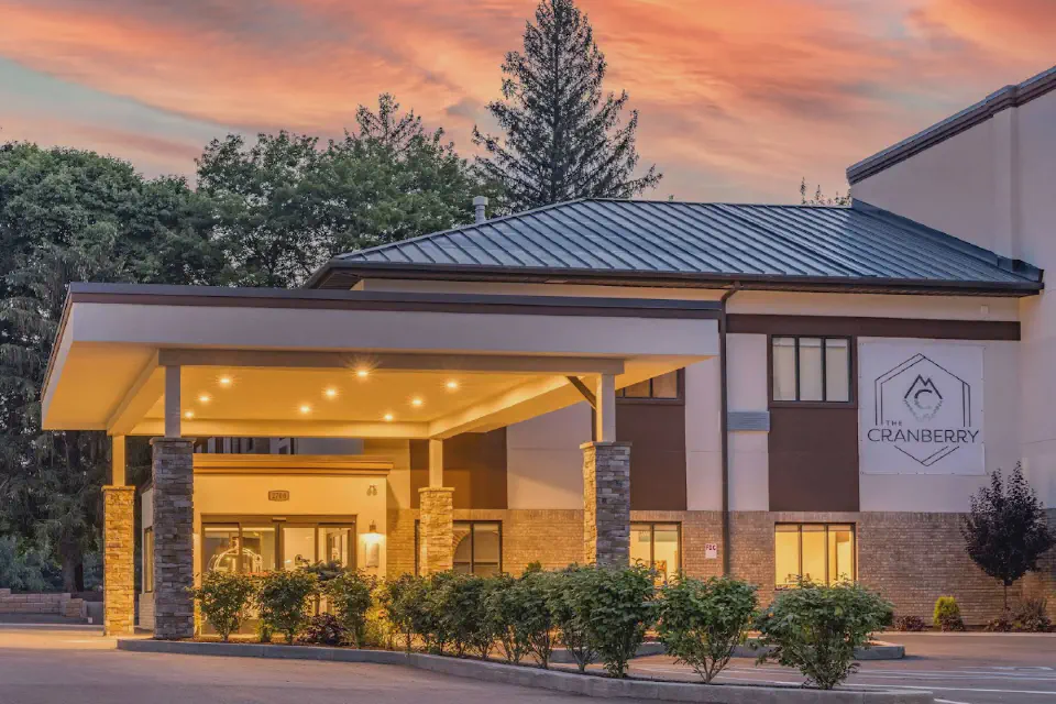 Modern 2-story hotel with covered entryway