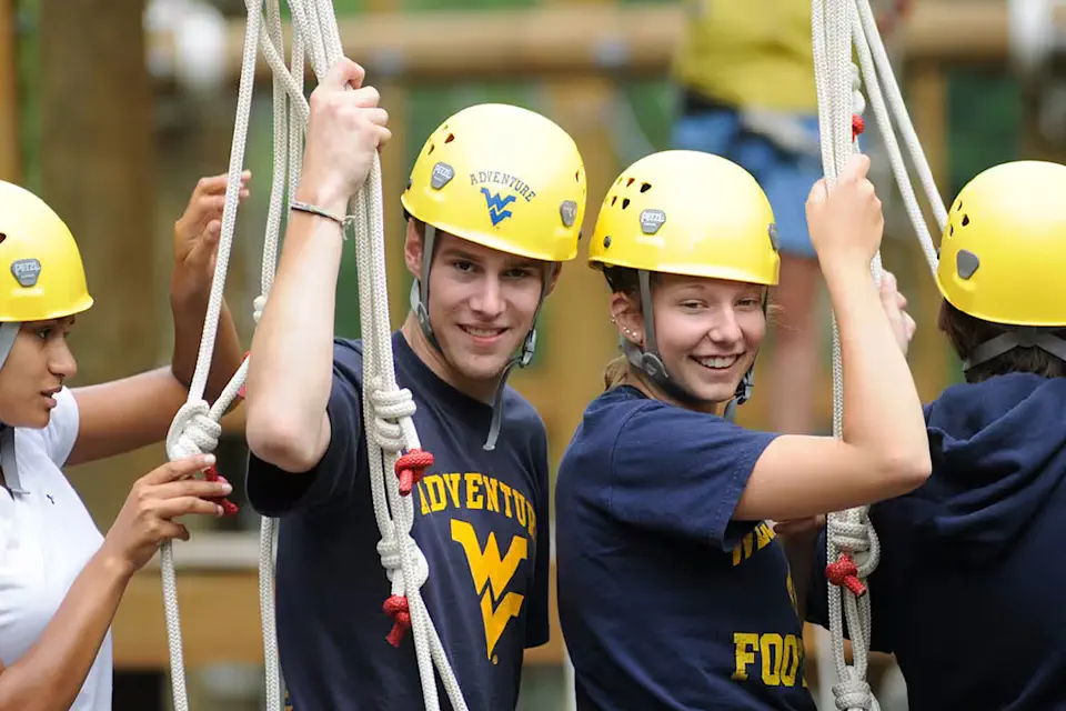 Adventure WV students take a break from climbing at the WVU Challenge Course