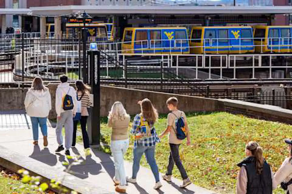 Students walking toward the Downtown PRT station