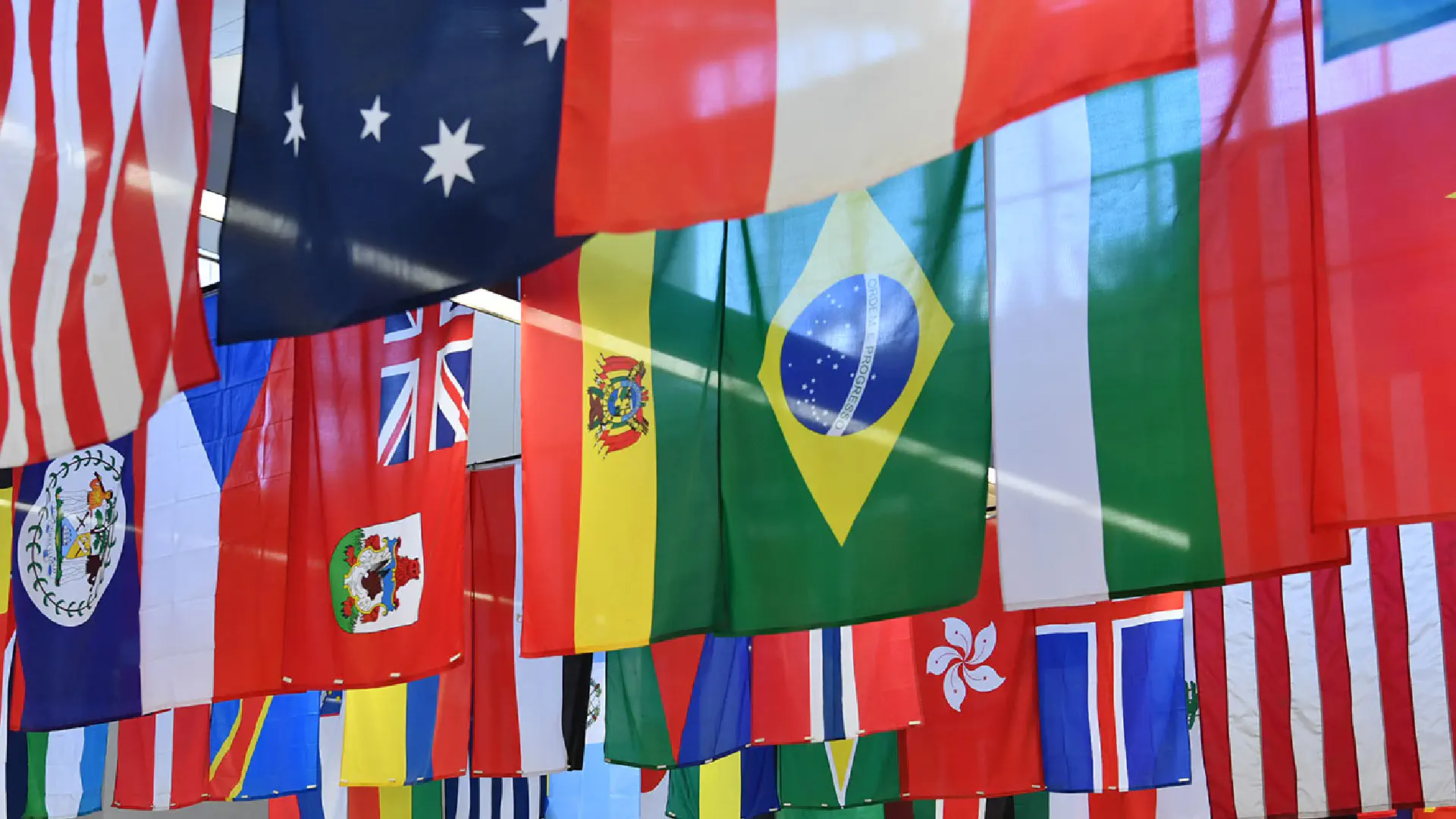 Flags of many different nations in the Mountainlair Student Union.
