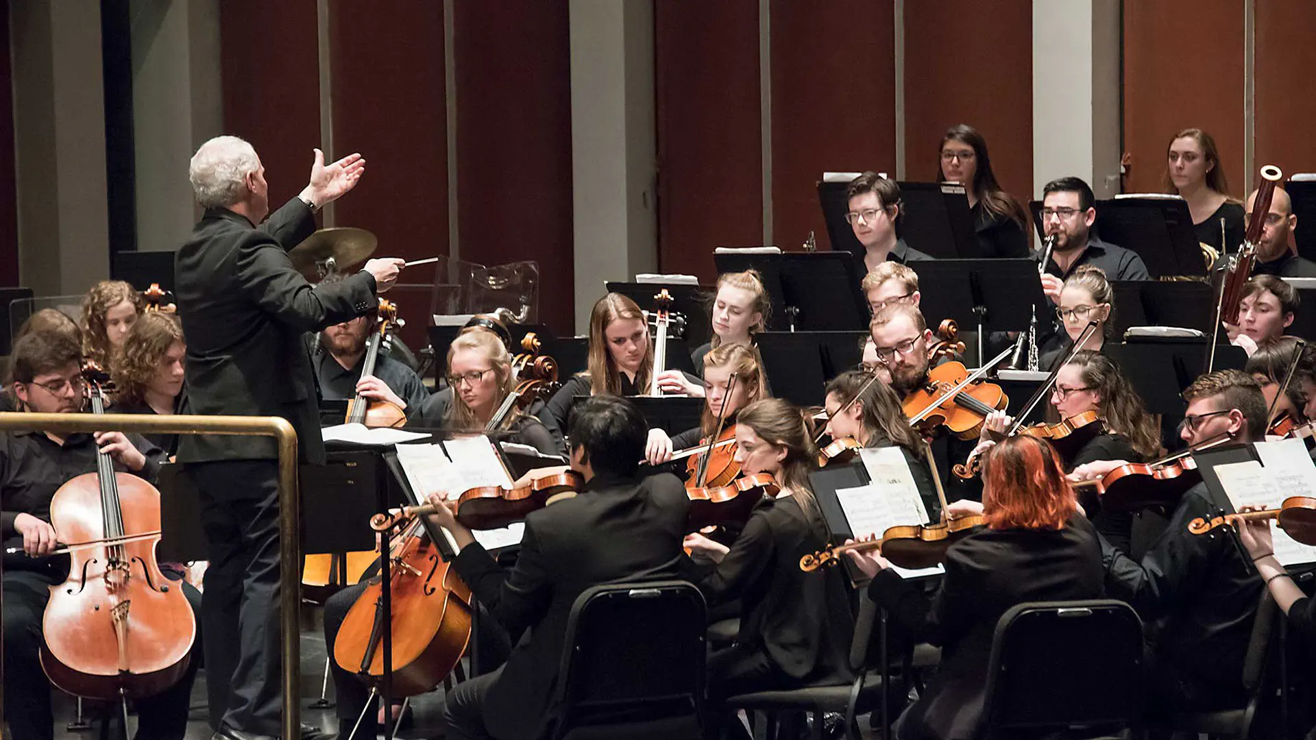 WVU orchestra playing in Lyell B. Clay Theatre