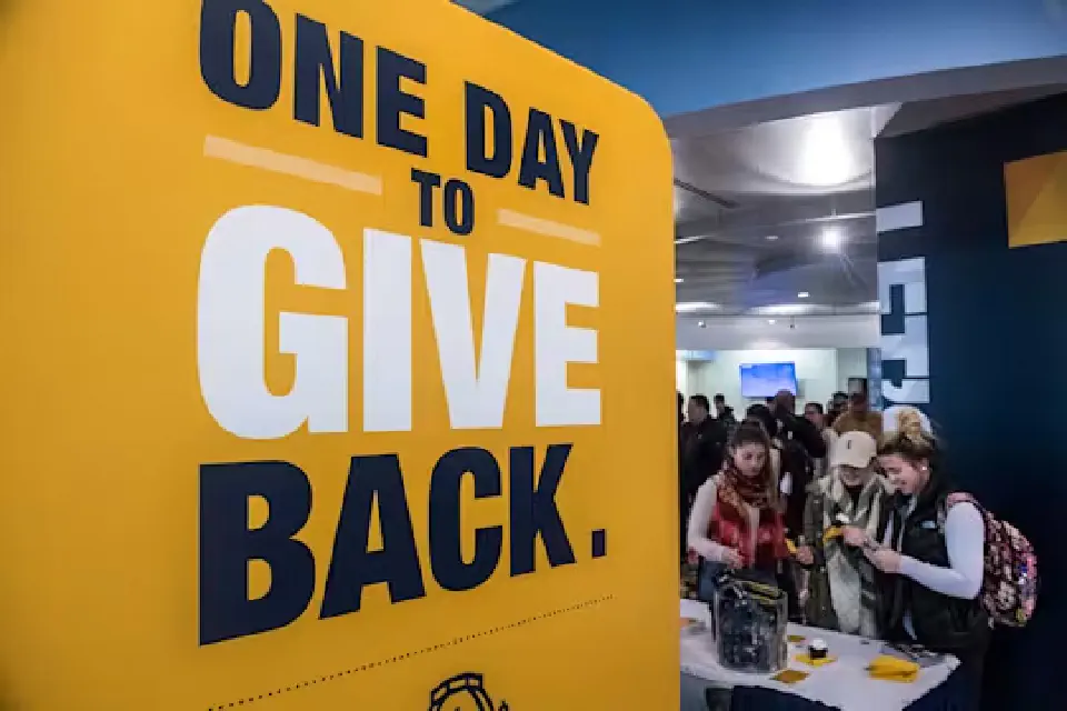 One Day to Give Back banner in the Mountainlair for Day of Giving